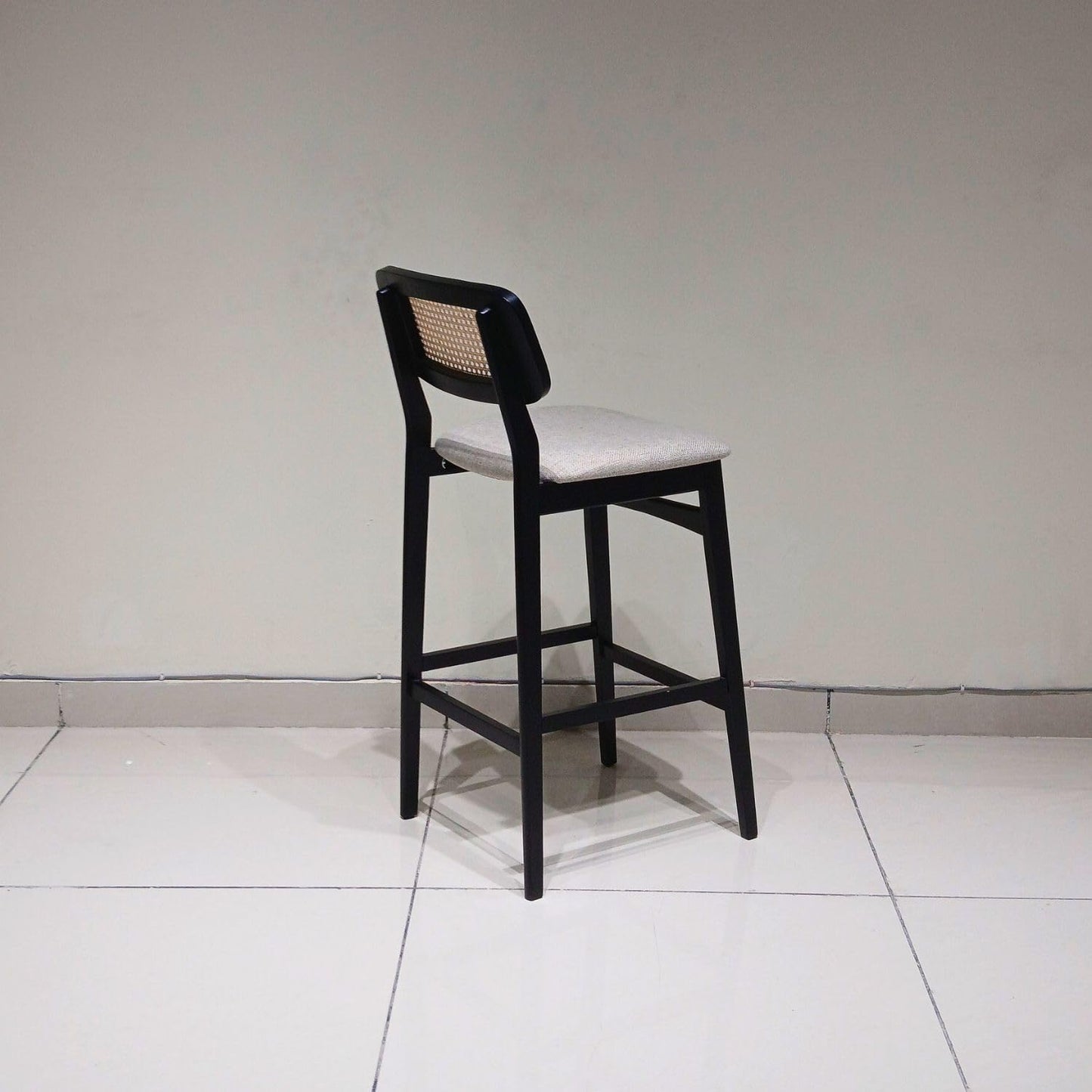 Black Wooden Bar Stool with Cane Backrest & Cushioned Seat