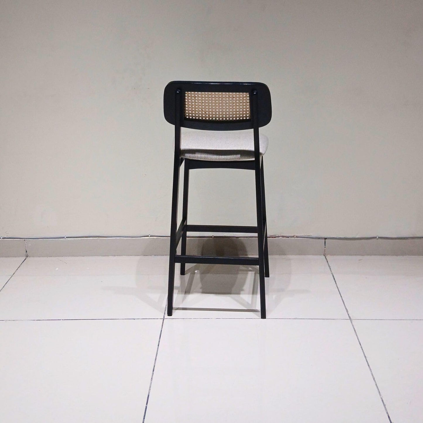 Black Wooden Bar Stool with Cane Backrest & Cushioned Seat